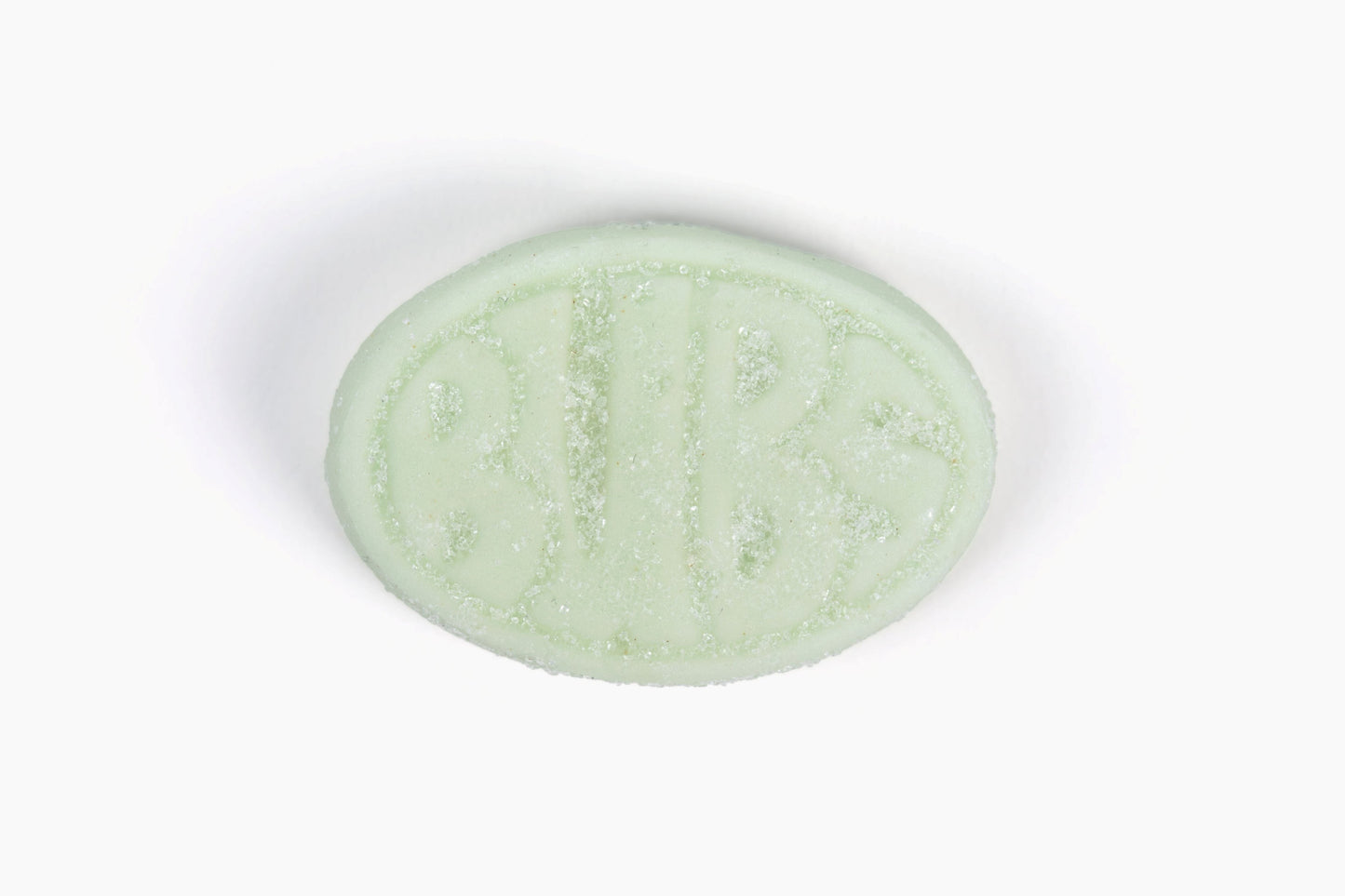 Swedish Candy Club, BUBS Fruity Pear Minis, light green oval candy with embossed BUBS logo and sugar coating.