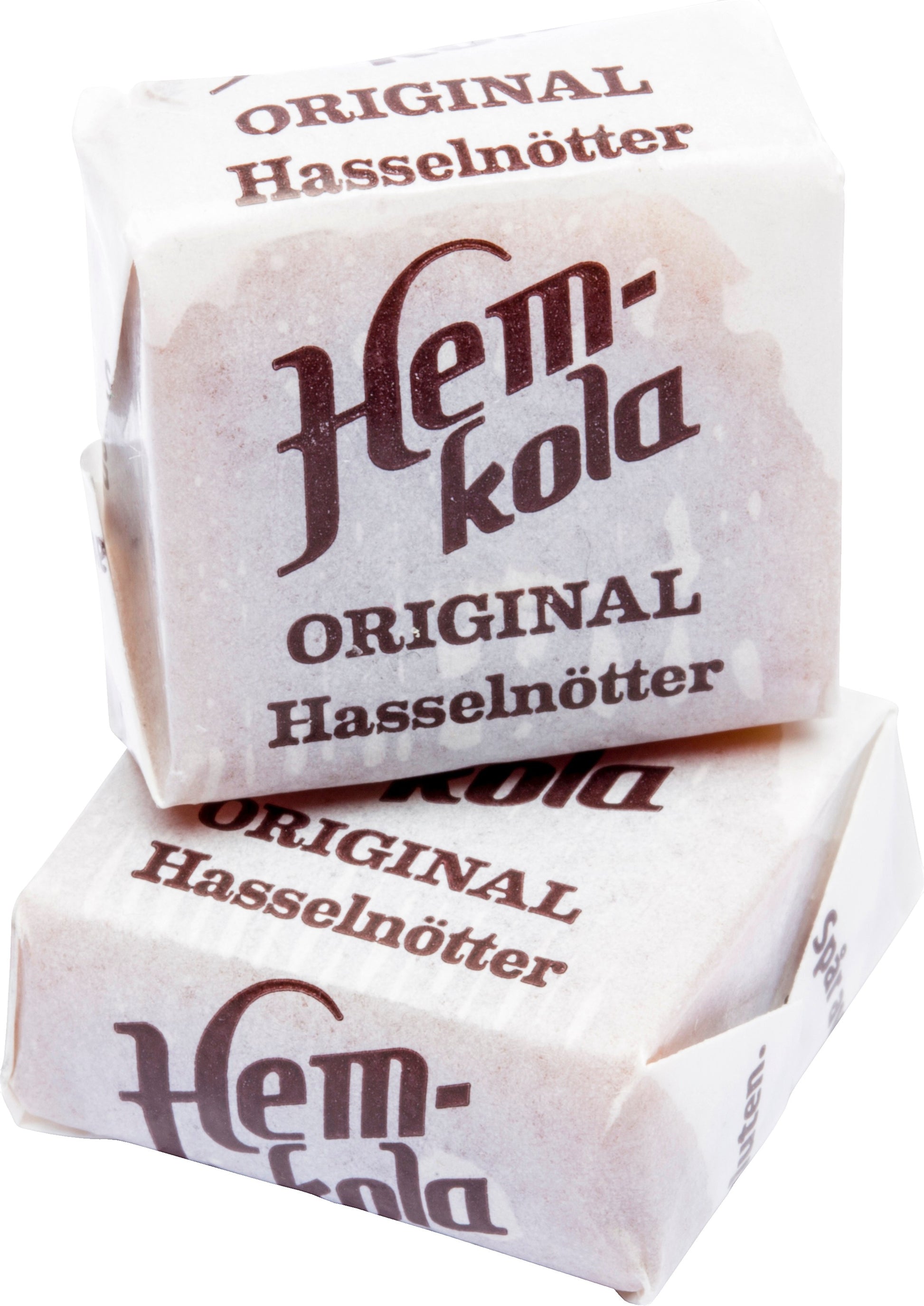 Swedish Candy Club's Hem-kola original hasselnötter individually wrapped candies. Two stacked, showing white paper wrappers with brown text.