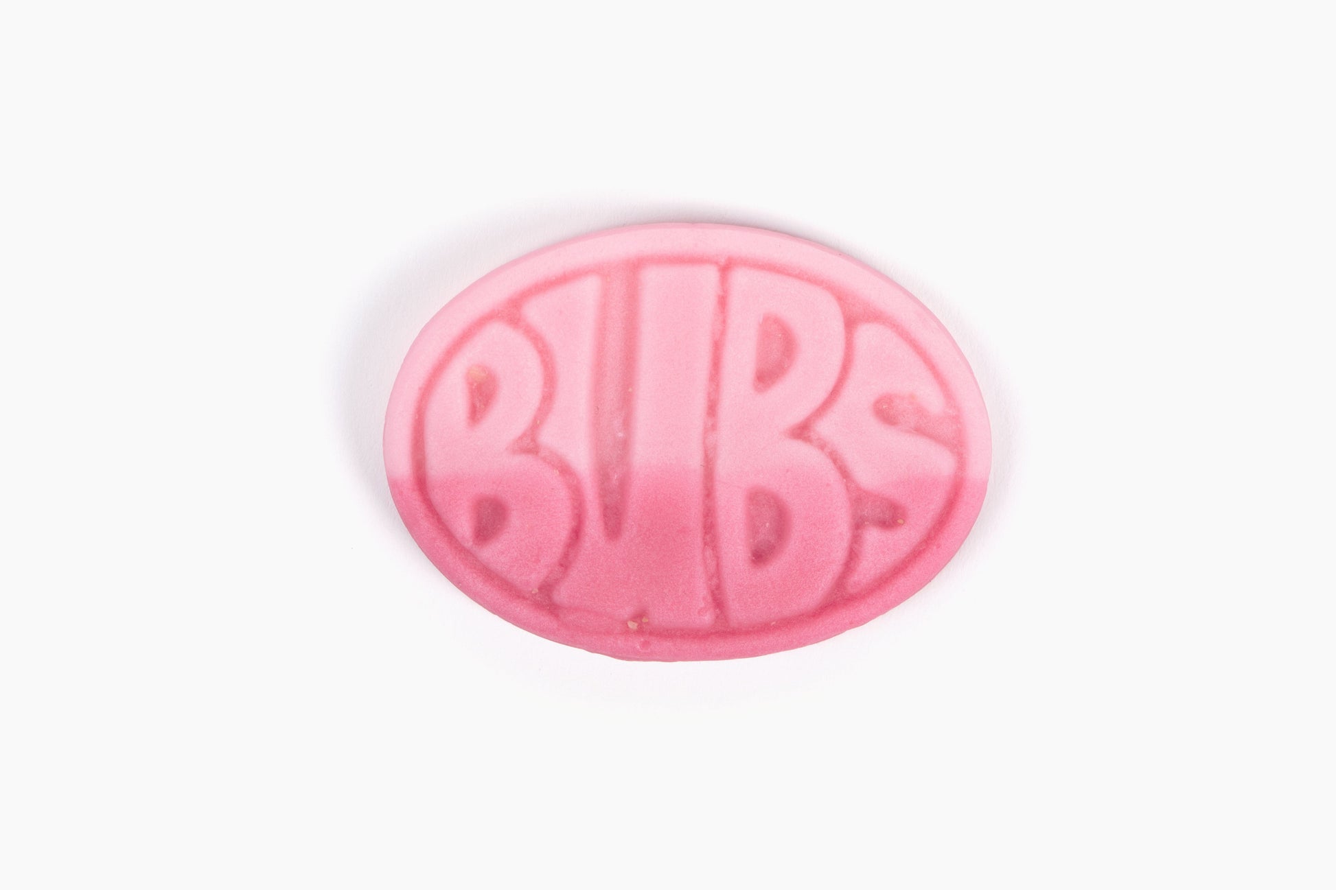 Swedish Candy Club pink oval gummy candy with BUBS logo embossed