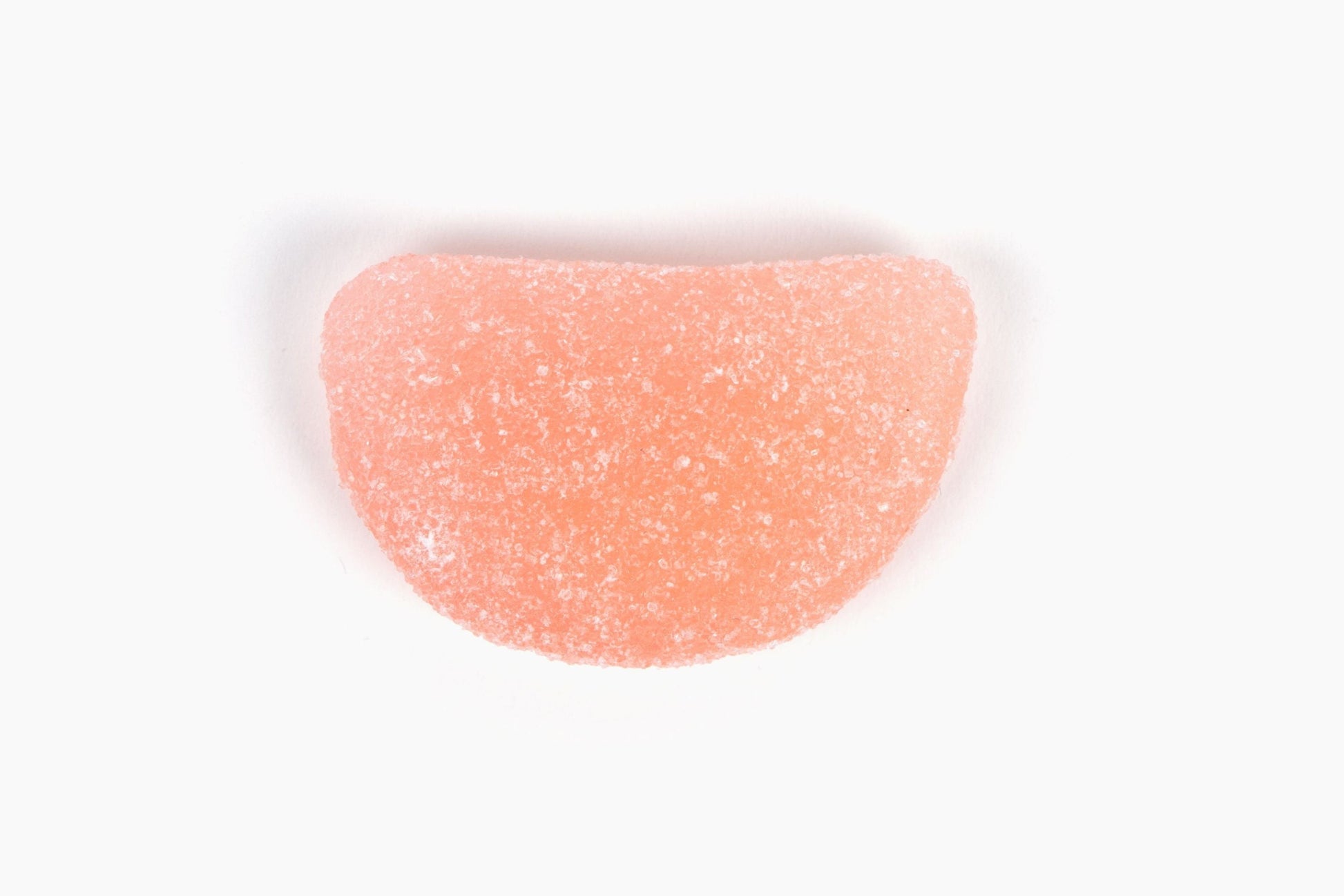 Swedish Candy Club Swede and Sour gummy candy, watermelon, peach-colored and sugar-coated.